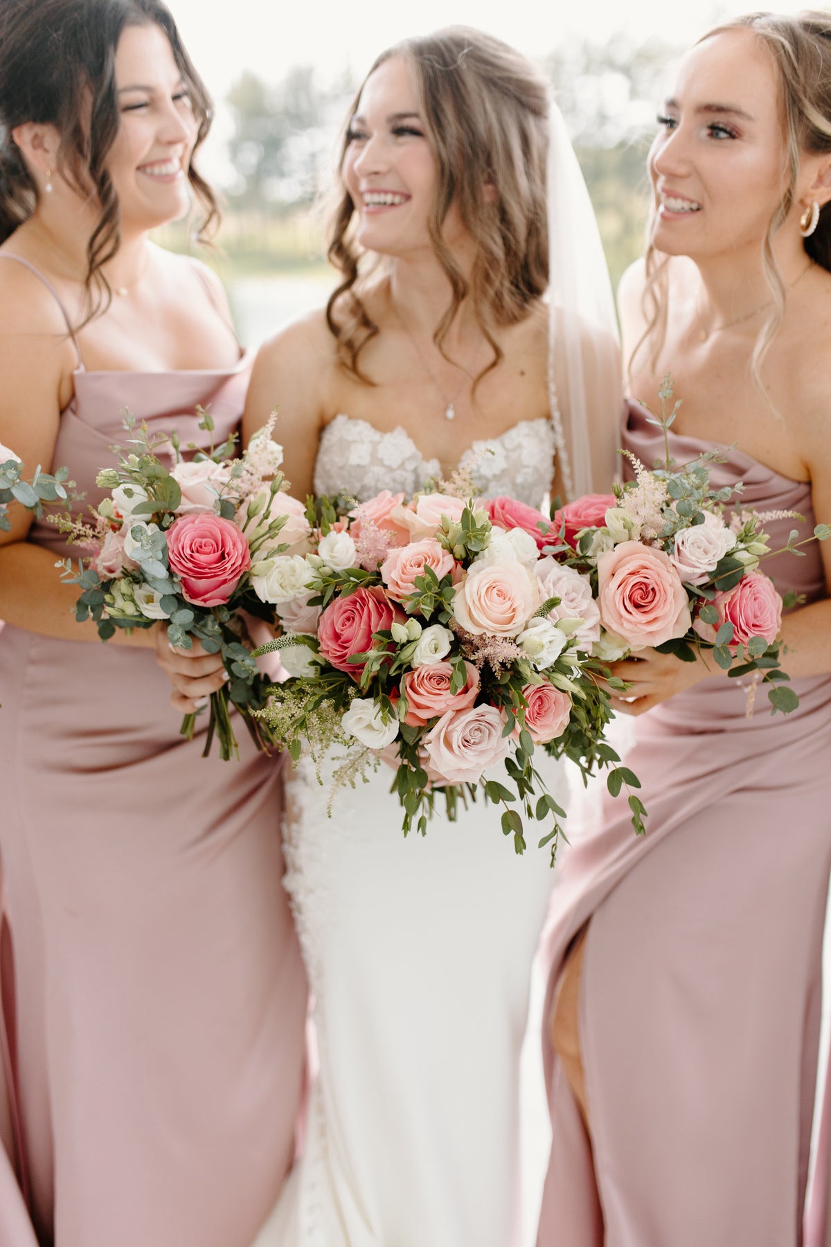 Pink, white, and green wedding florals with bridal bouquet and bridesmaids' bouquets, Pella, Iowa